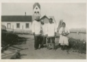 Image of Dr. and Mrs. Hettasch with Inuit couple